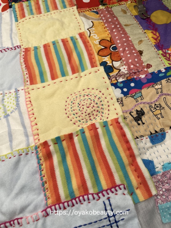 オーダーのお品 パッチワークのブランケット ベビー服をリメイク