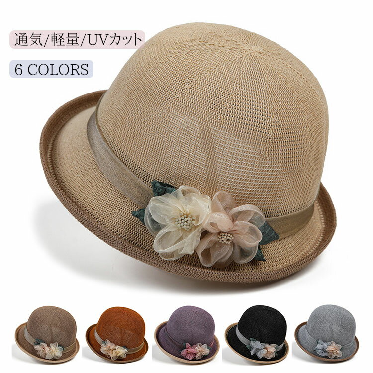 麦わら帽子をかぶった年配の幸せなインドの女性農家が庭に座って鉢植えの植物の世話をする。庭で鉢植えの花を植えるスリランカの年配の笑顔の女性。現役シニア。ガーデニングのコンセプトの写真素材・画像素材Image 201214391