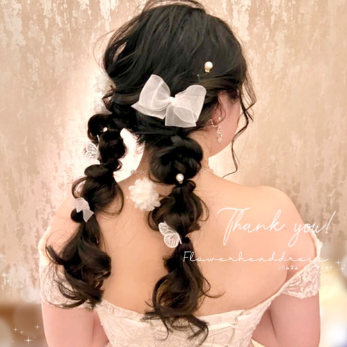 結婚式のお呼ばれにぴったりなツインテールを 編み込みやリボンを組み合わせた可愛いスタイルです！亀井 里奈 CLEAR of hair池下所属 のヘアカタログ 20240228184218 ミニモ