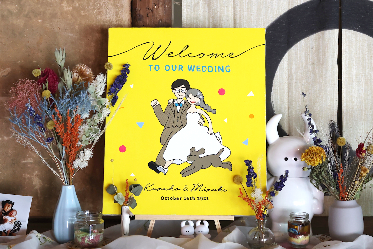 当日の桜をあしらってこしらって。友人手作りウェルカムボード-ゼクシィ