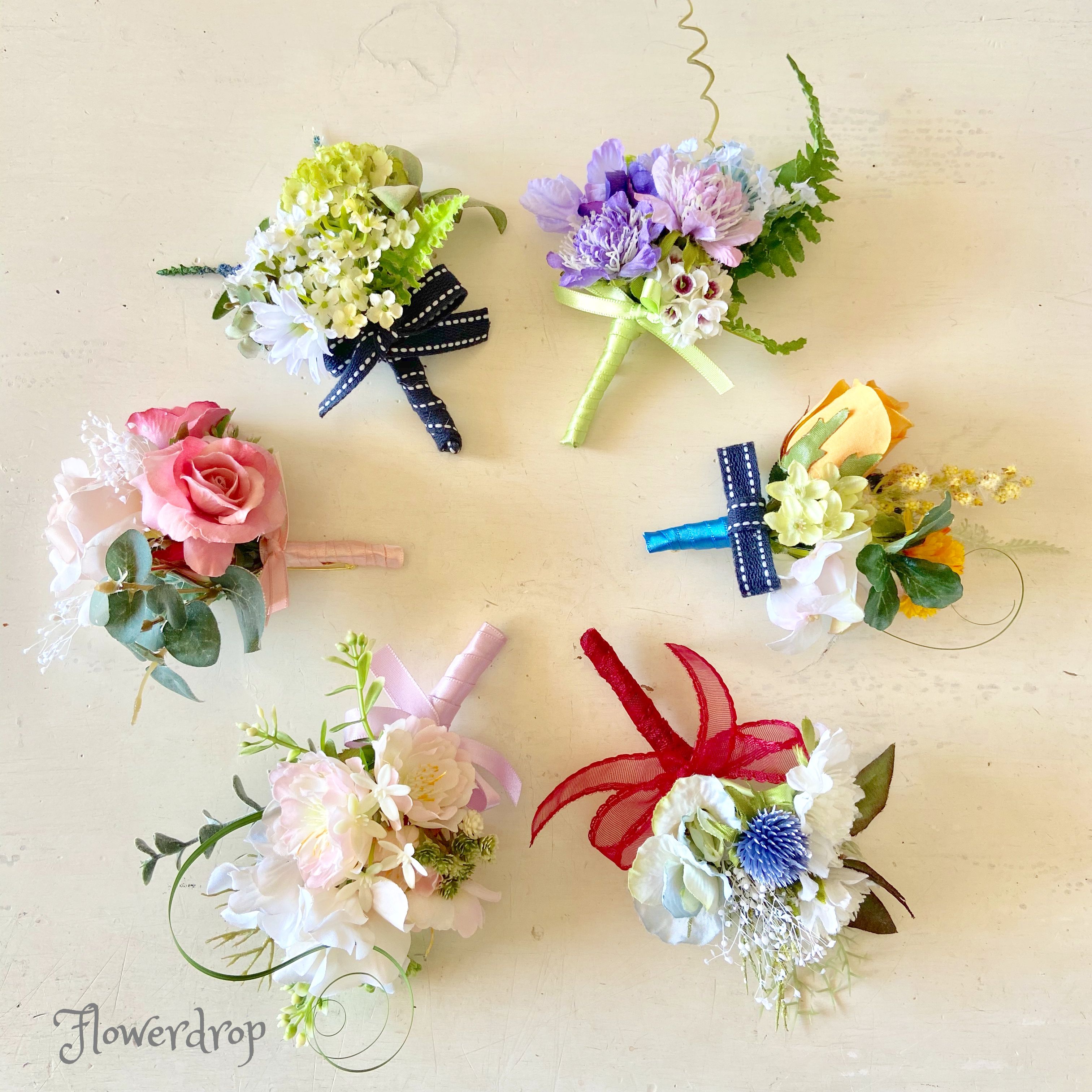 ぽんぽんコサージュ赤