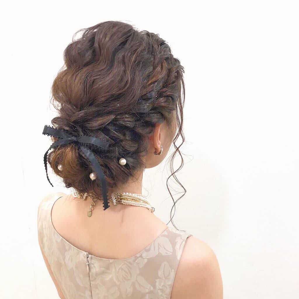 結婚式の髪形は編み込みアレンジで決定！こなれ感抜群のお呼ばれヘアを覗いてみて♡MERY