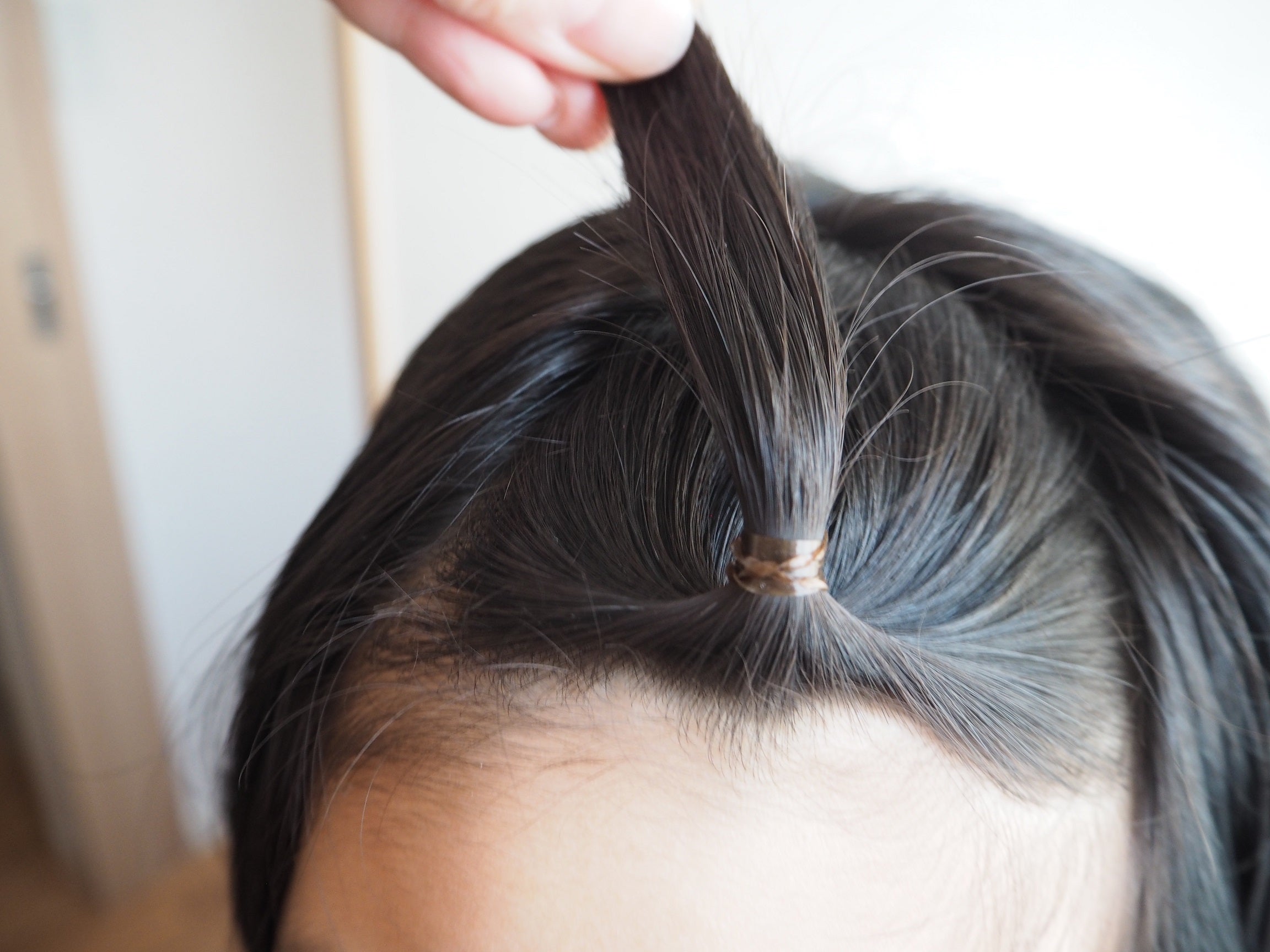 前髪結ぶのを喜ぶ男の子赤ちゃんと子どもが大好き