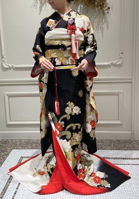 黒の引き振袖。挙式は白無垢で決まっていましたが、当時、妊娠７か月の身で披露宴は 衣装口コミ・評判TAKAMIBRIDAL タカミブライダルウエディングパーク